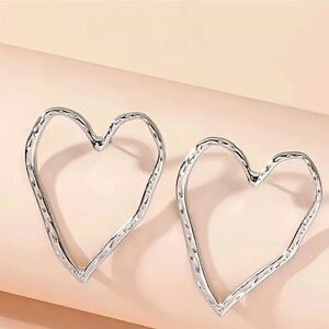 Heart silvertone stud earrings